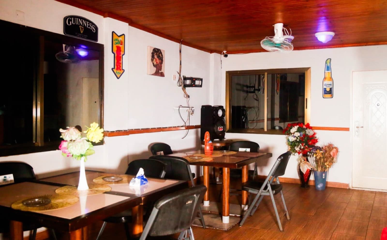 The on-site restaurant and bar area at JC Guest House