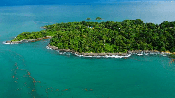 Aerial view of Banana Island surrounded by turquoise water