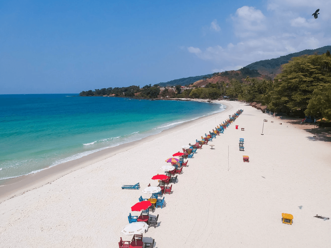 White sand and colourful beach seating at River Number Two