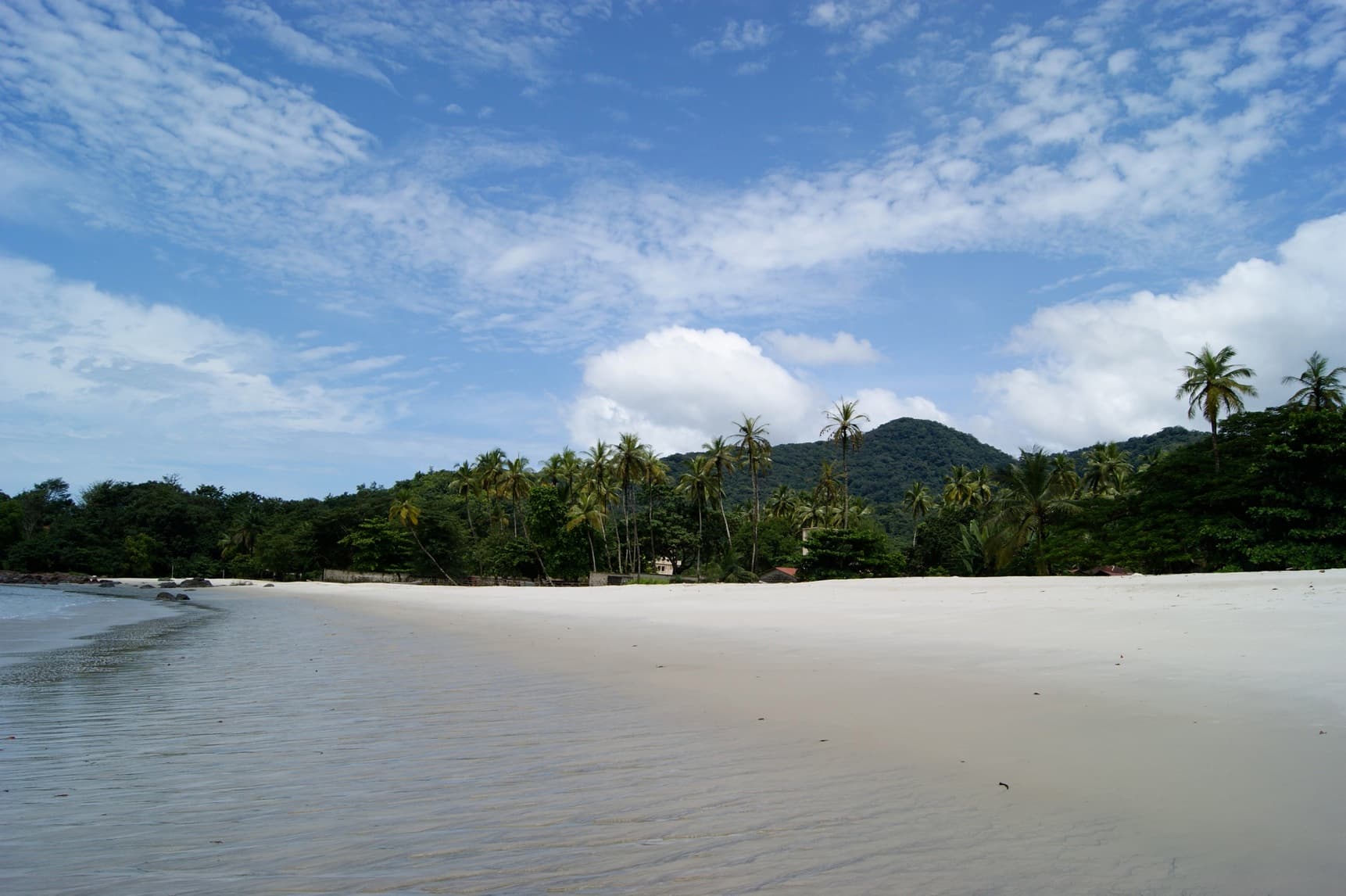 White sand, palms and green hills at River Number Two Beach